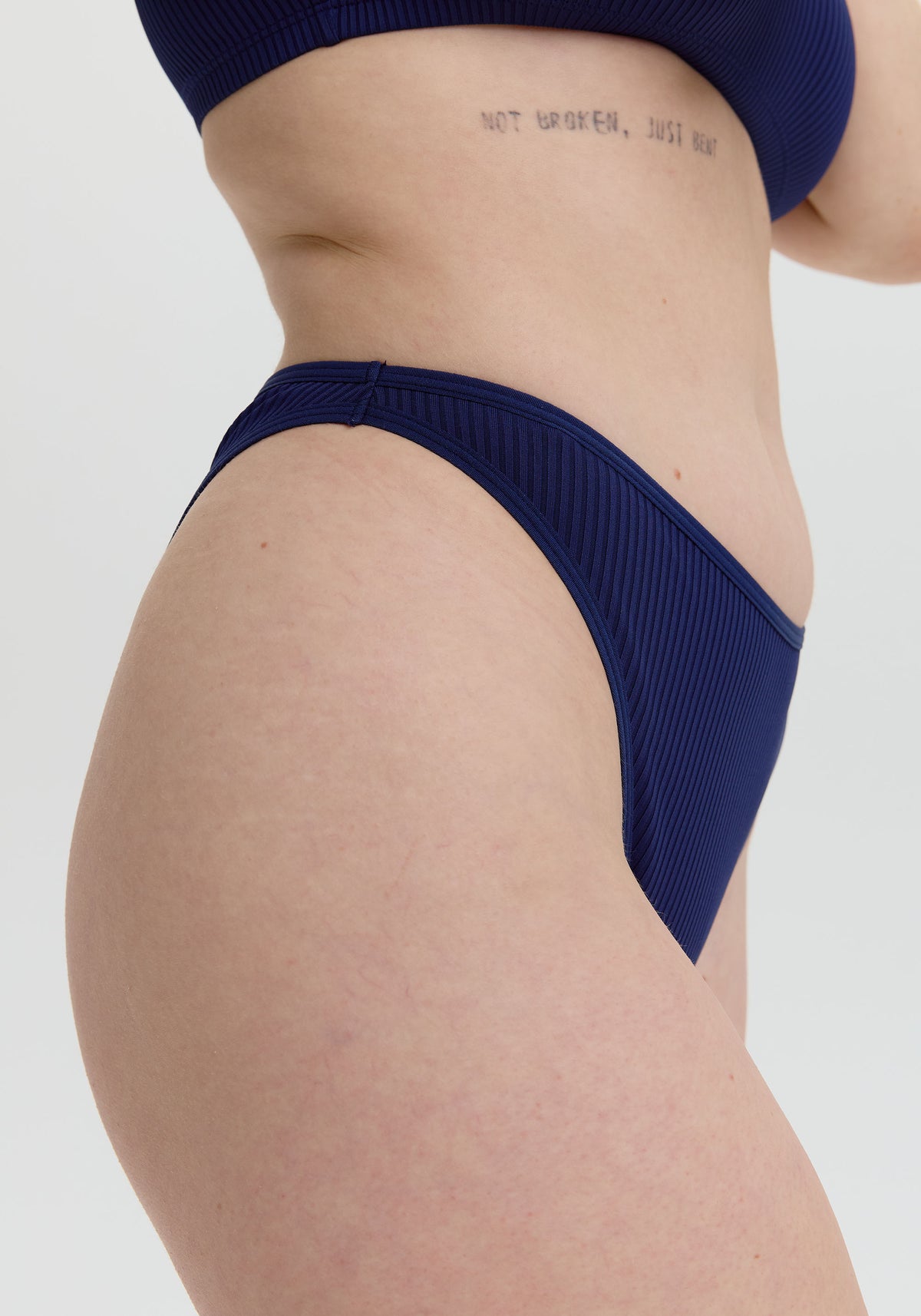 model is wearing an S panty - blue the rib high leg bikini