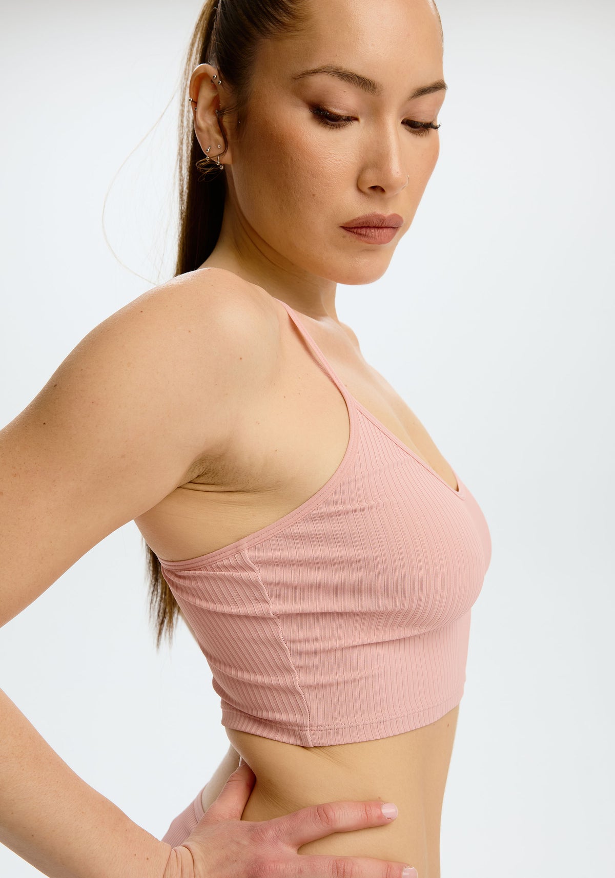 model is wearing an S cami - pink the rib crop cami