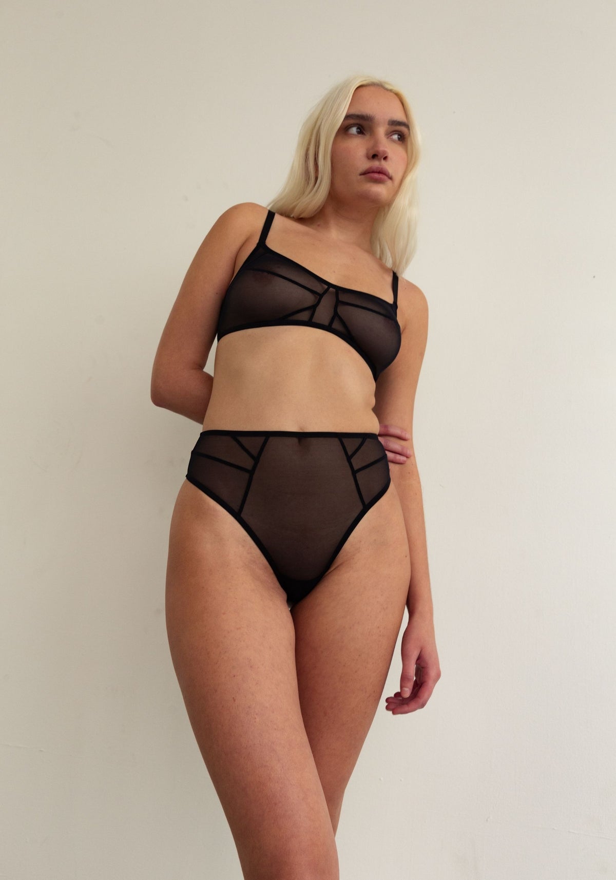 model is wearing an S panty-black hypnose high waist thong