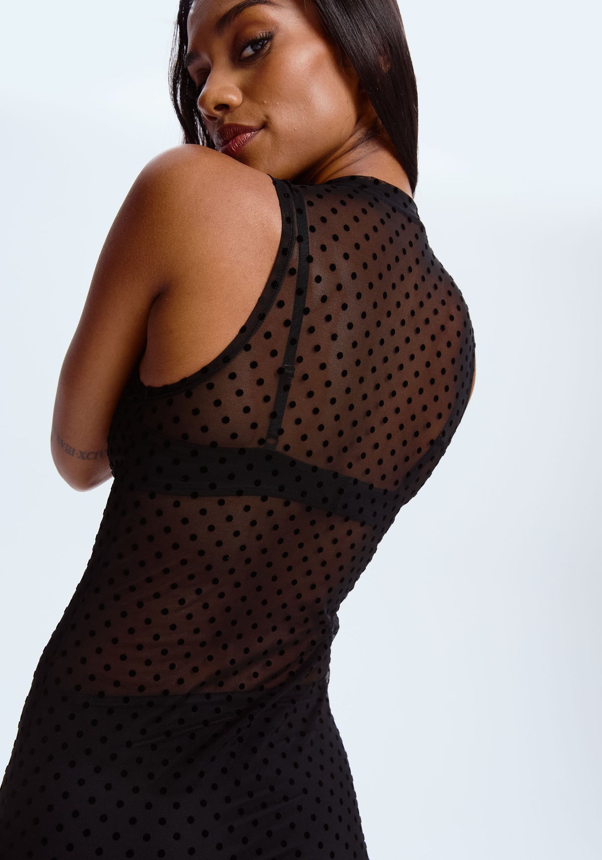 model is wearing an XS dress-black enigma dress