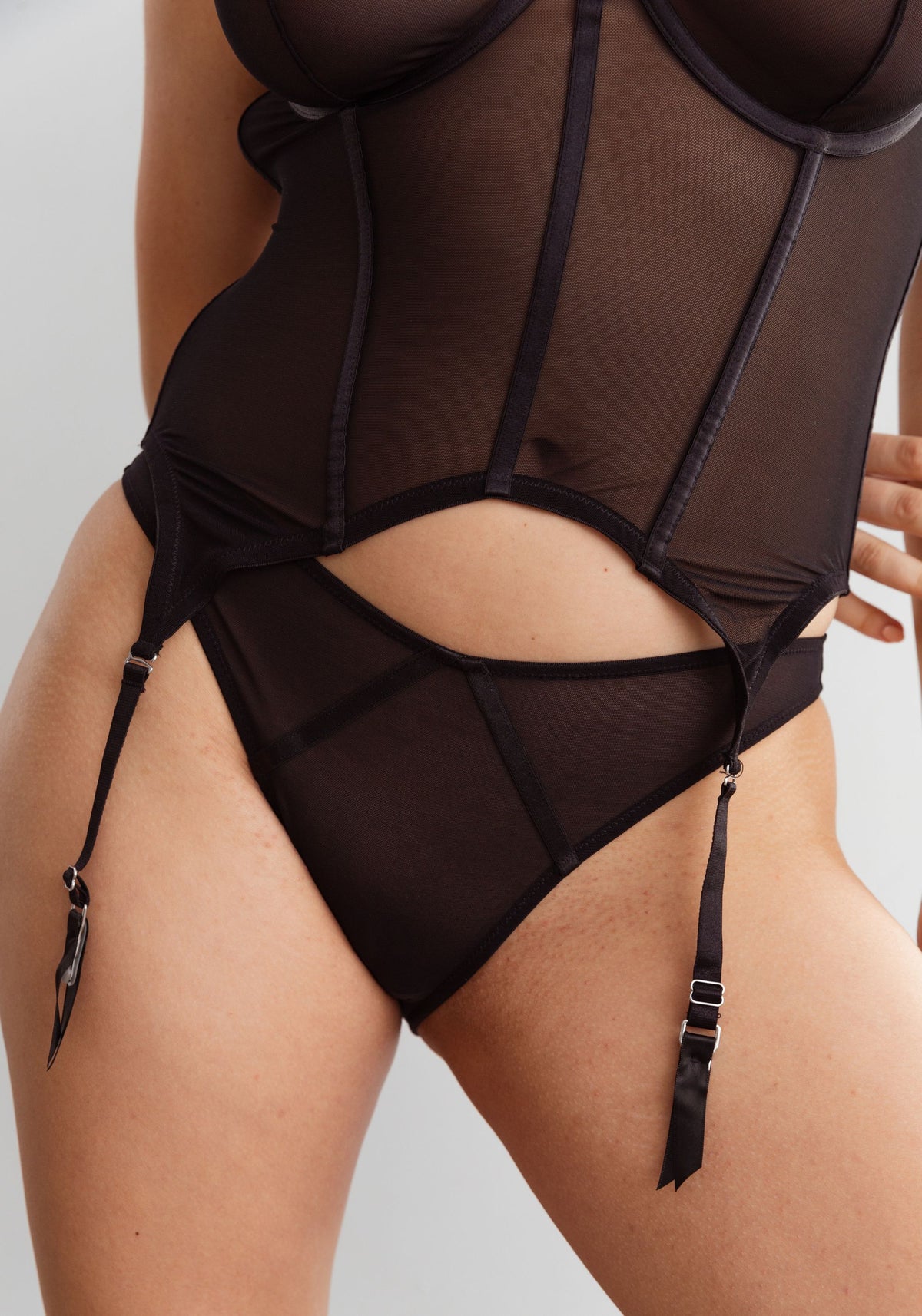 model is wearing an L corset-black ivy corset