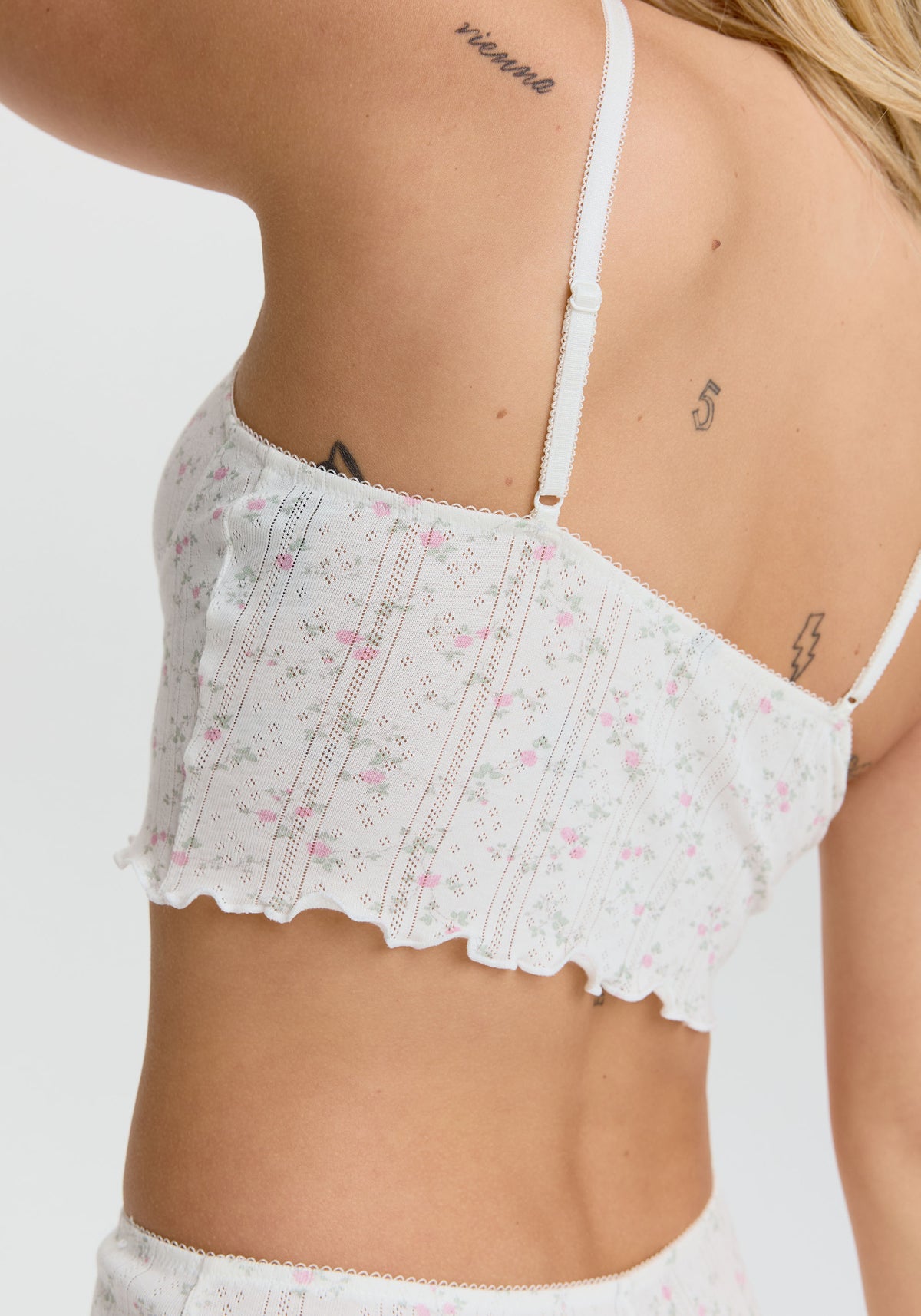 model is wearing an S cami - multi,white dream cotton pointelle crop cami