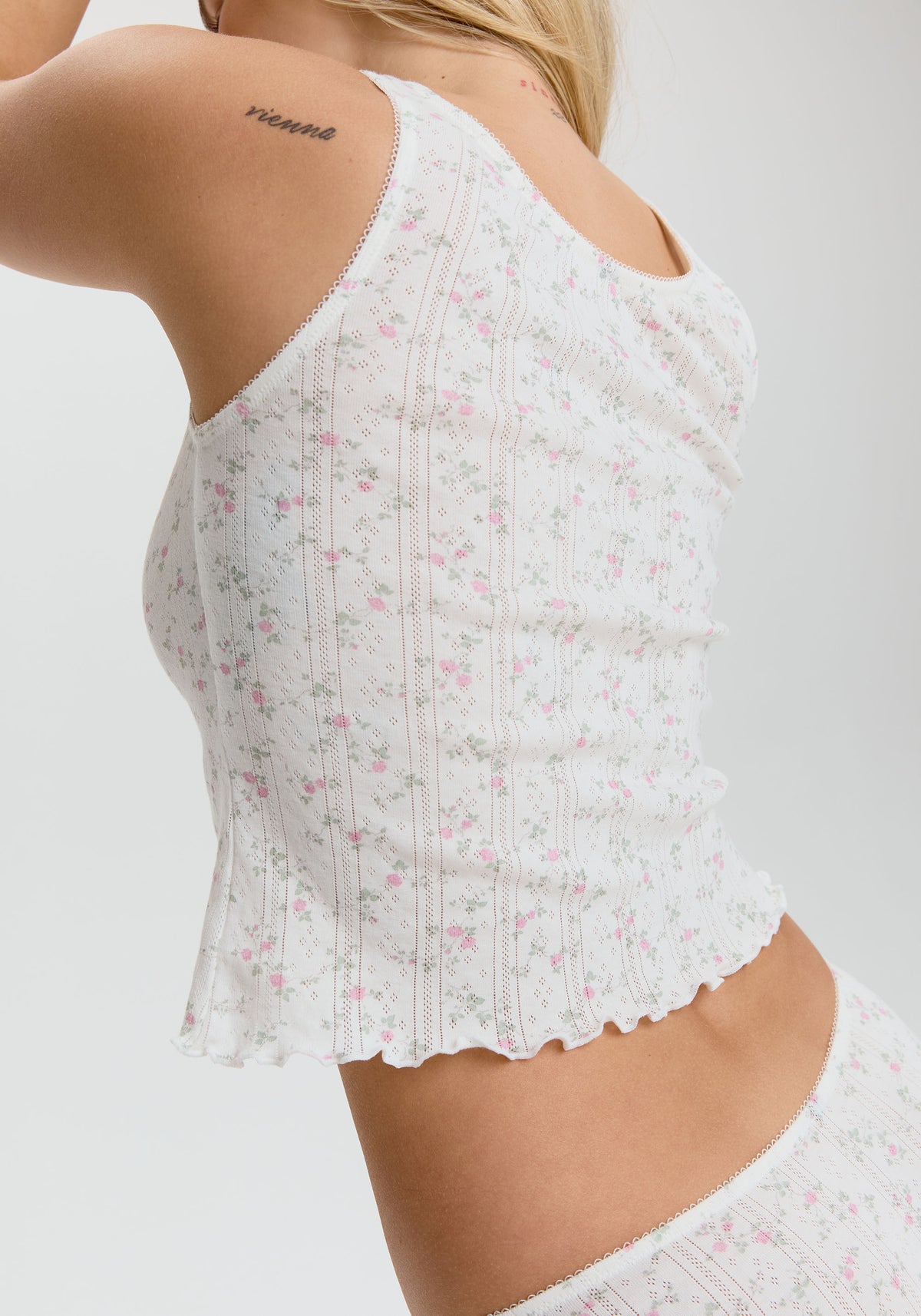 model is wearing an S tank - multi,white dream cotton pointelle tank