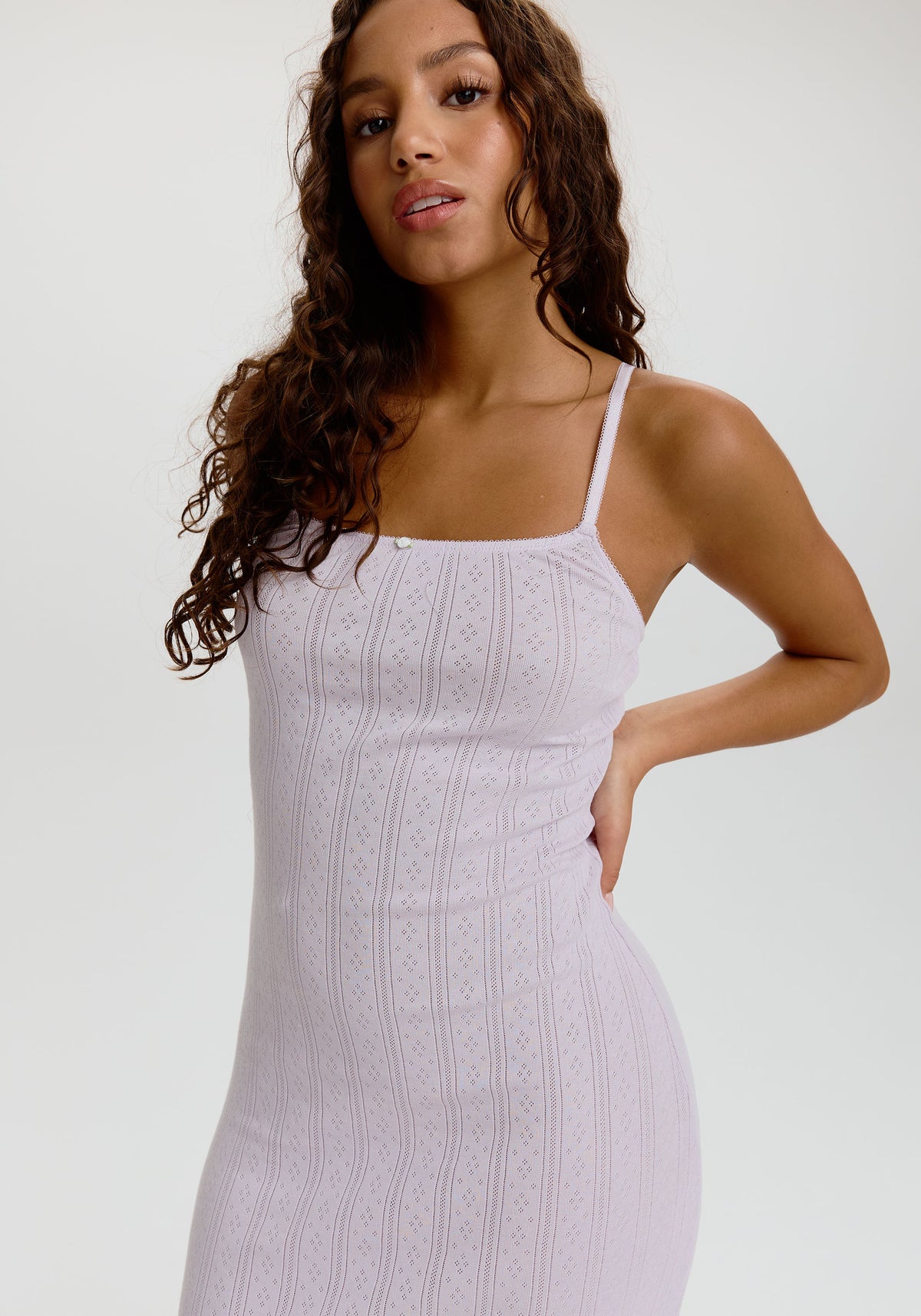 model is wearing an XS midi dress - purple dream cotton pointelle midi dress