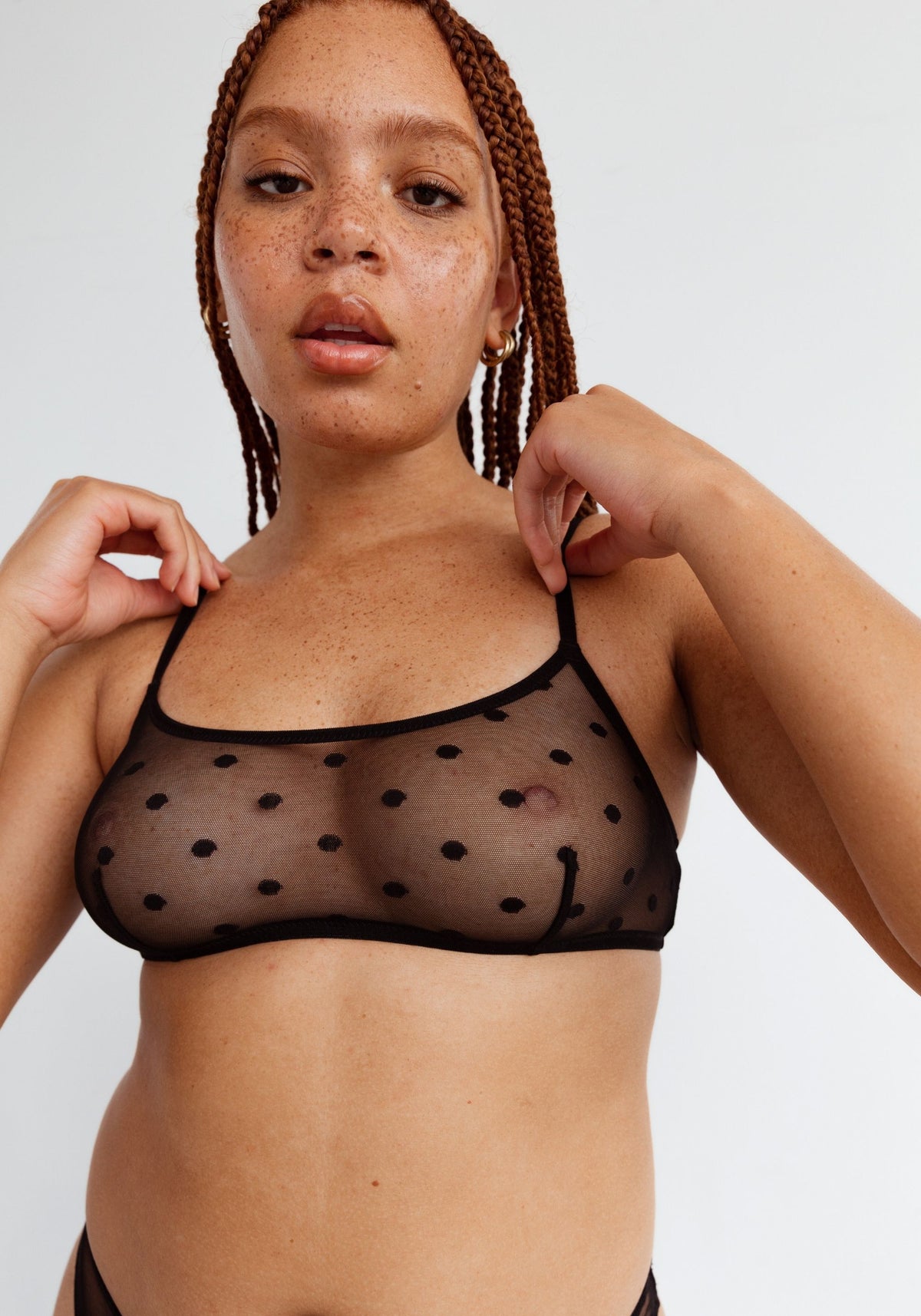 model is wearing an M bralette-black obsidian bralette