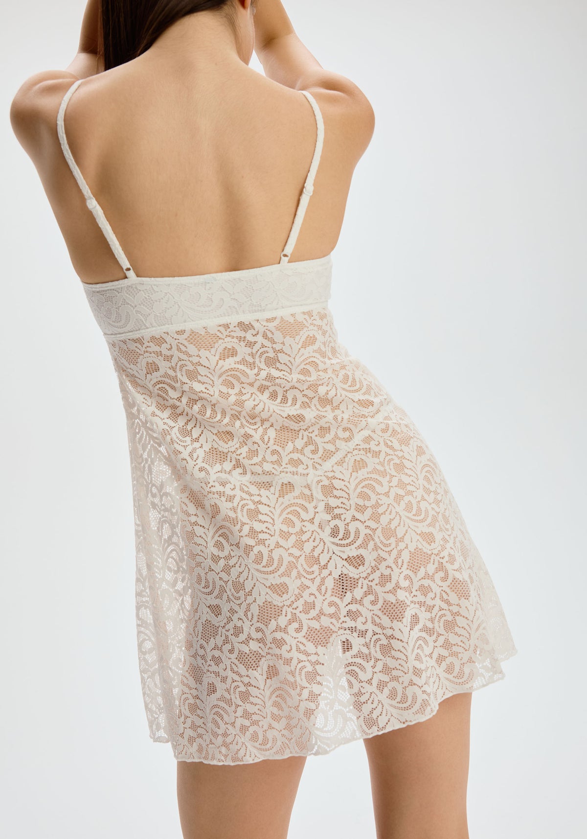 model is wearing an S mini dress - white etherea mini dress