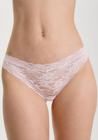 model is wearing an XS panty - pink the lace rosette bikini