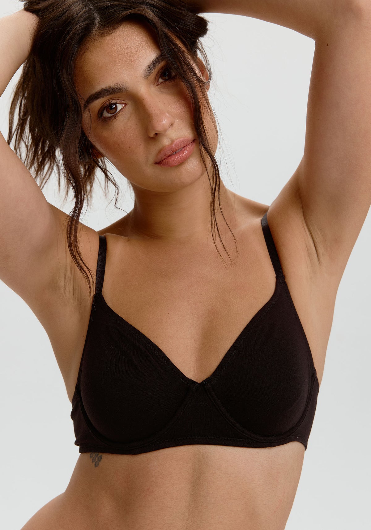 model is wearing a size 32D bra-black the cotton unlined molded bra