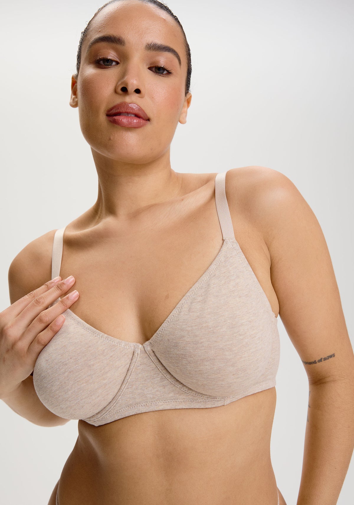 model is wearing a 34D bra - nude the cotton unlined molded bra