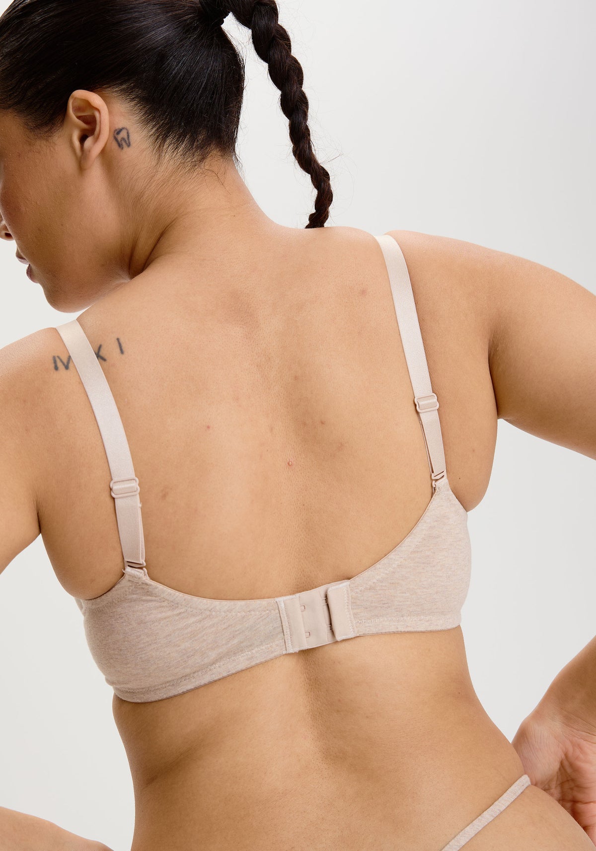 model is wearing a 34D bra - nude the cotton unlined molded bra