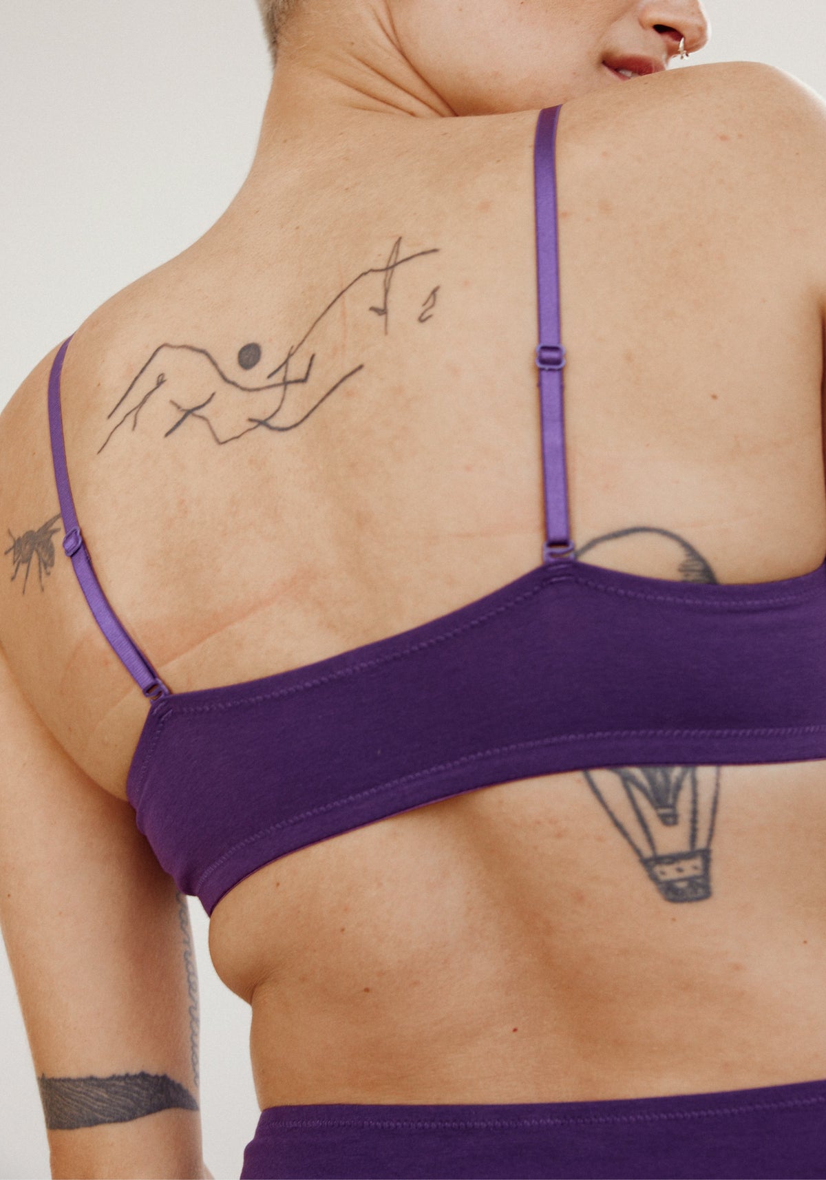 model is wearing an M bralette-purple the cotton bralette