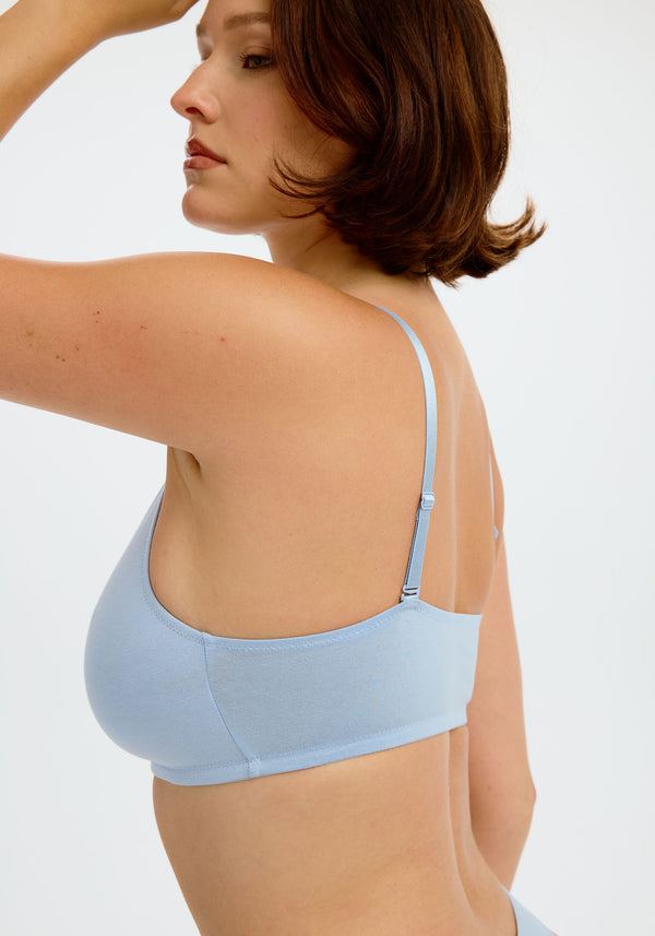 model is wearing an S+ bralette - blue the cotton bralette