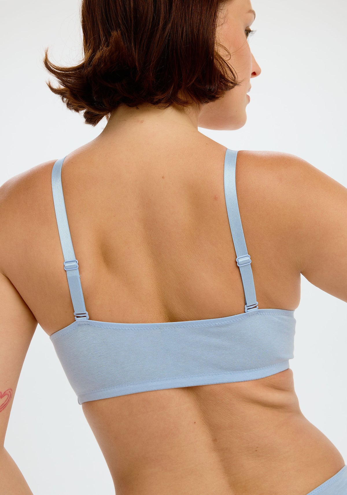 model is wearing an S+ bralette - blue the cotton bralette