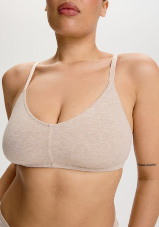 model is wearing an S+ bralette - nude the cotton bralette