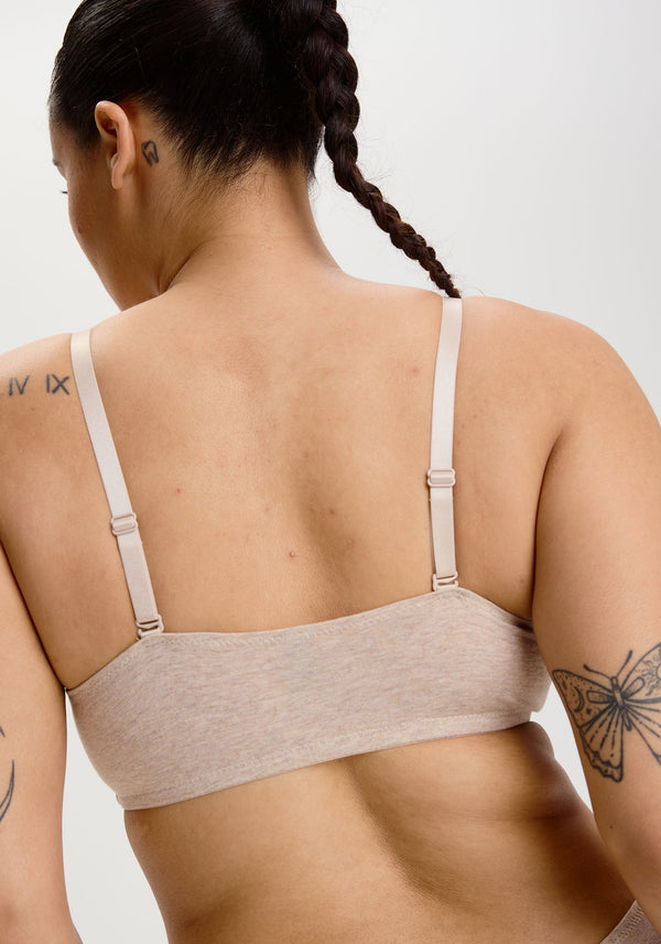 model is wearing an S+ bralette - nude the cotton bralette