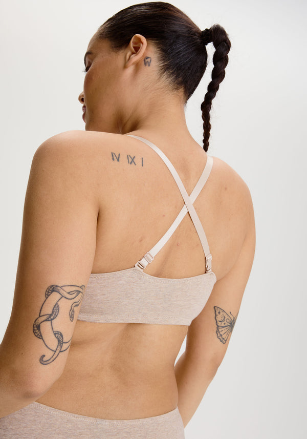model is wearing an S+ bralette - nude the cotton bralette