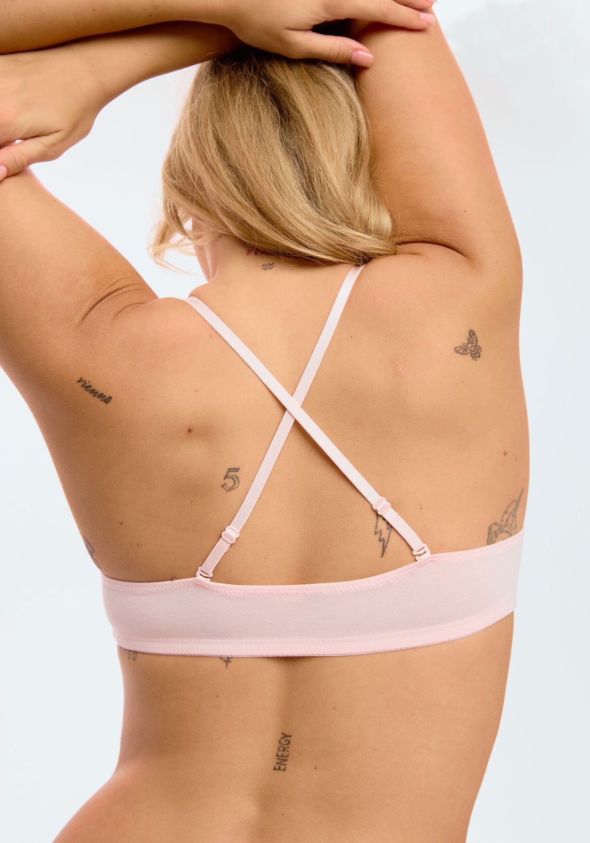 model is wearing an S bralette-pink the cotton bralette