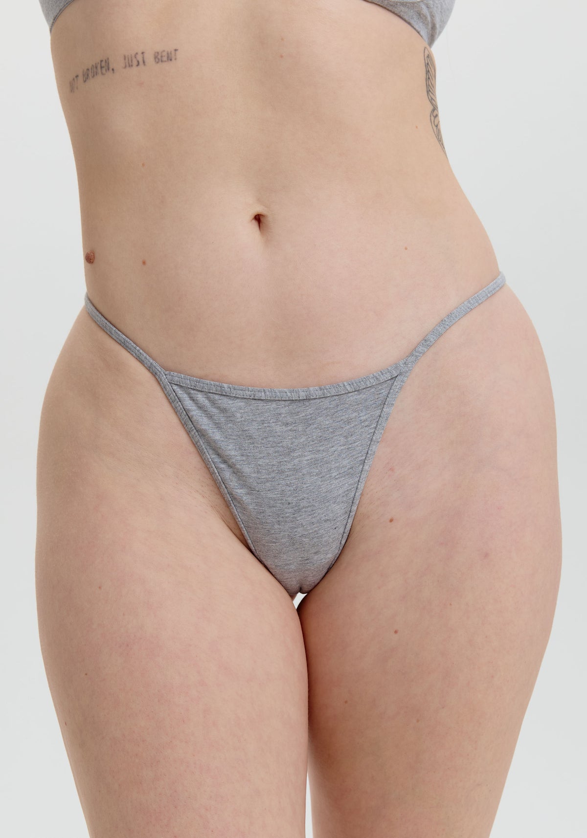 model is wearing an S panty-grey the cotton string