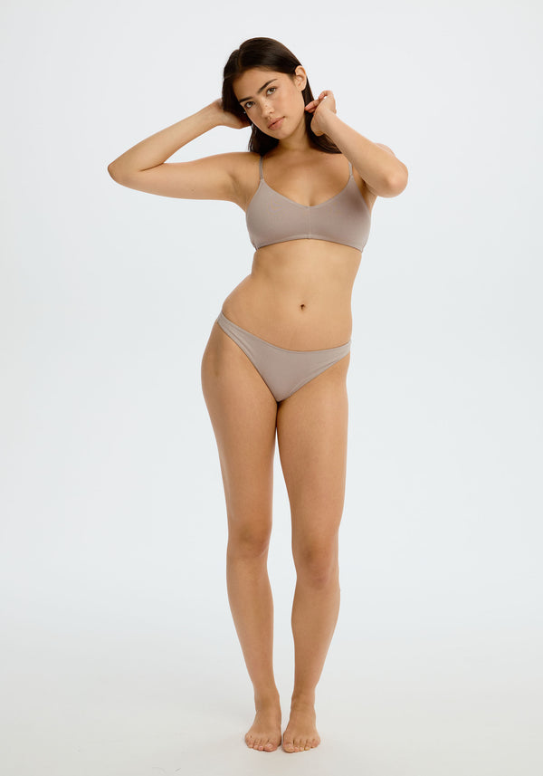 model is wearing an S panty - grey the cotton low rise thong