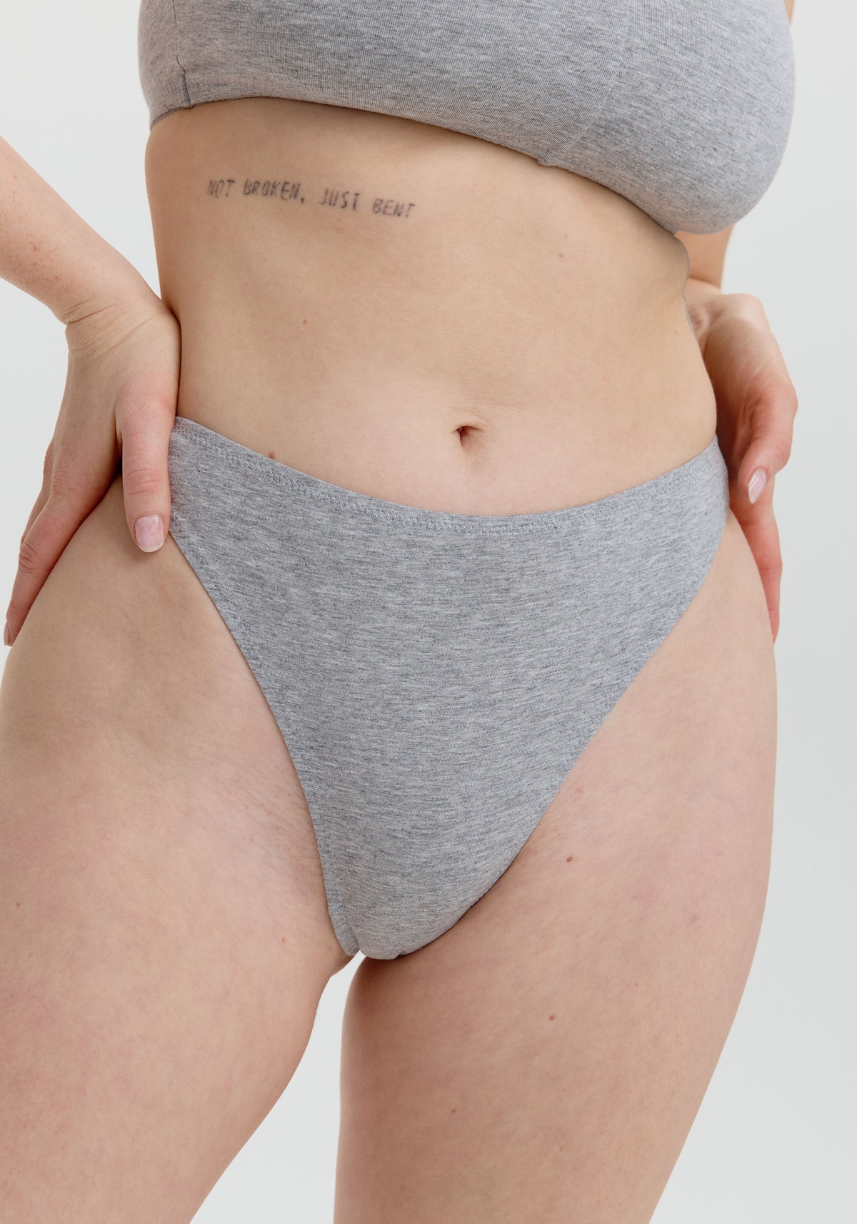 model is wearing an S panty-grey the cotton high leg thong