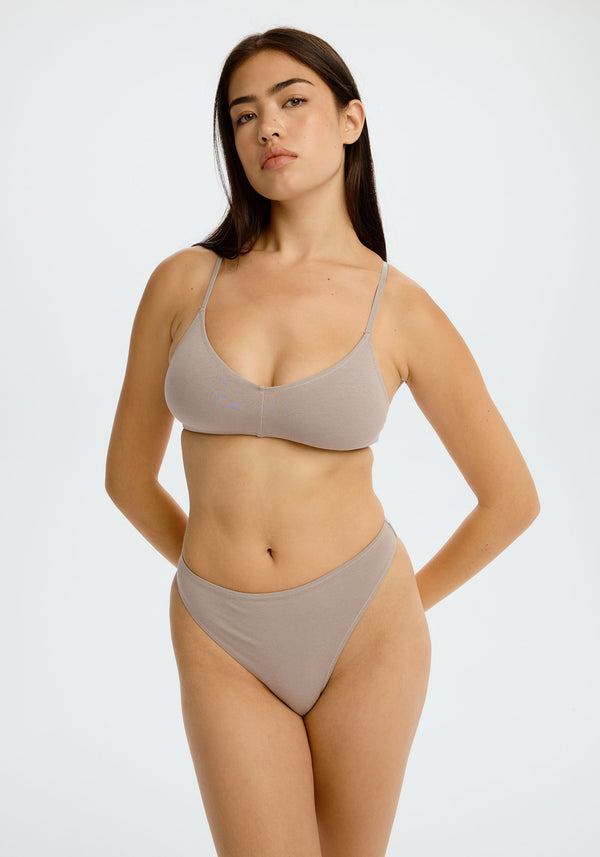 model is wearing an S panty - grey the cotton high leg thong
