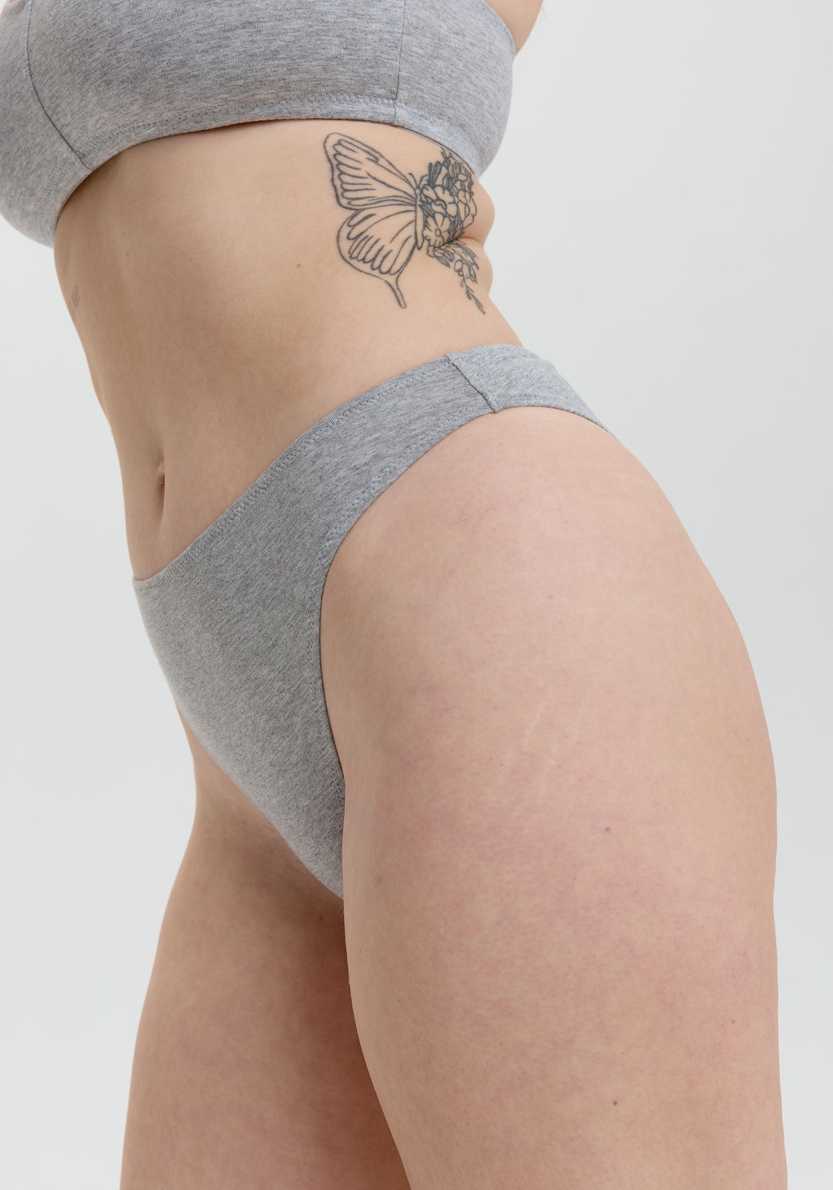 model is wearing an S panty-grey the cotton high leg bikini