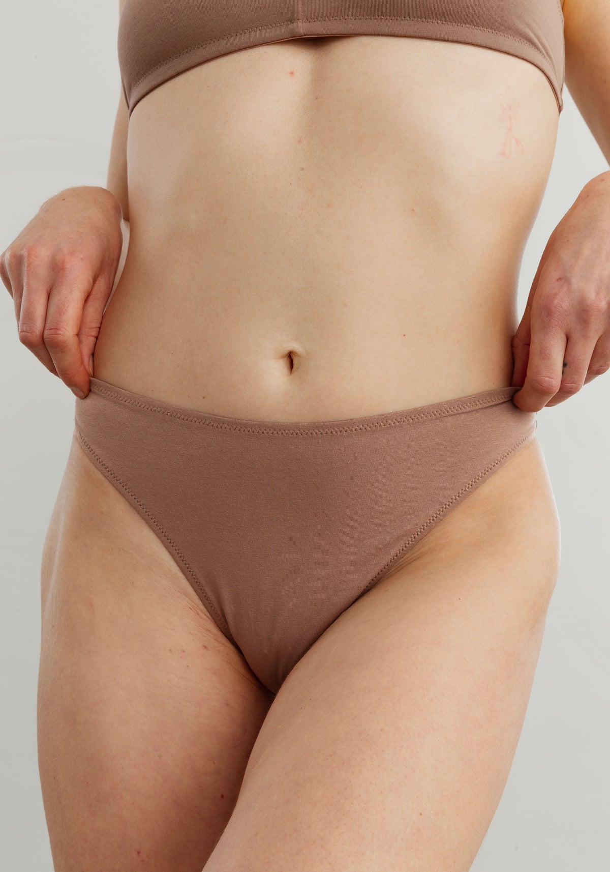 model is wearing an S panty-nude the cotton high leg bikini