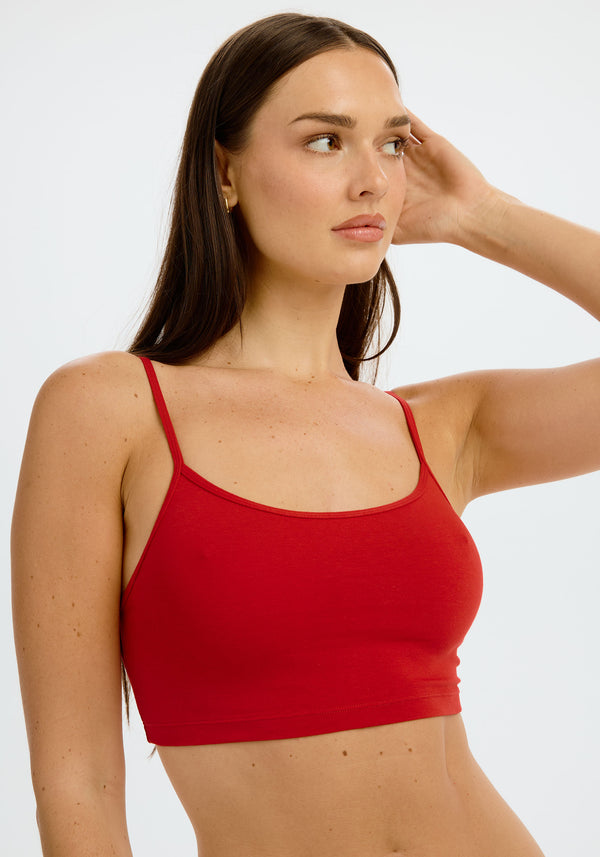 model is wearing an S cami - red the cotton crop cami