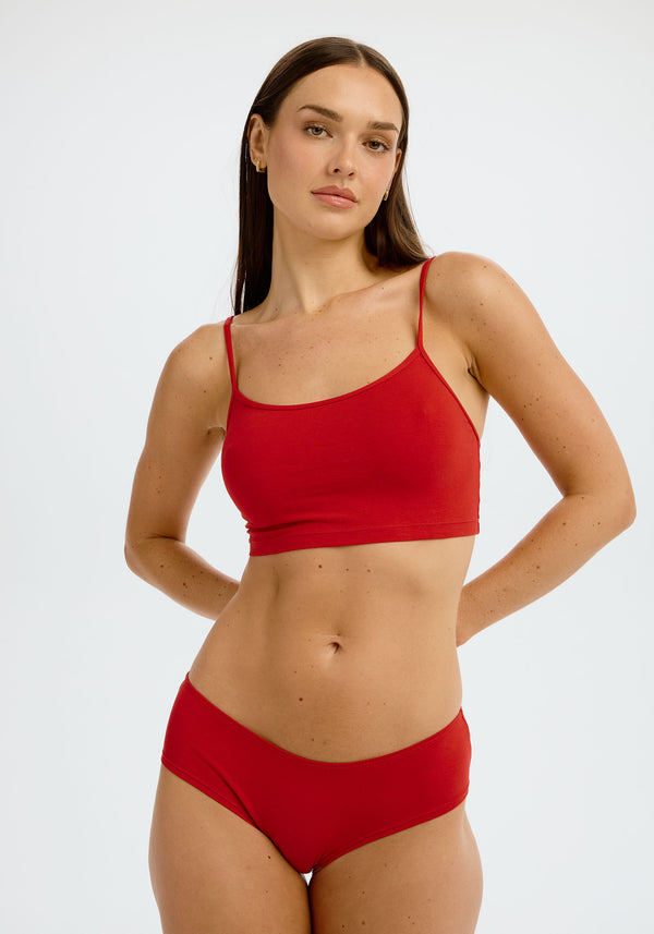 model is wearing an S cami - red the cotton crop cami