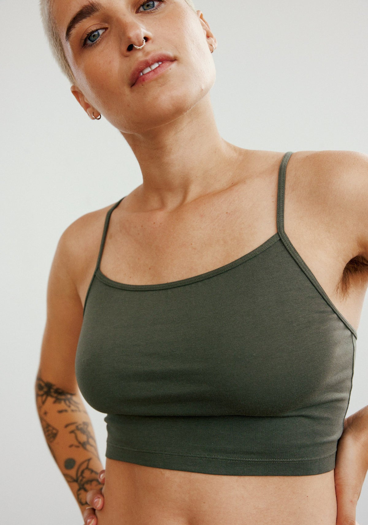 model is wearing an M cami - green the cotton crop cami