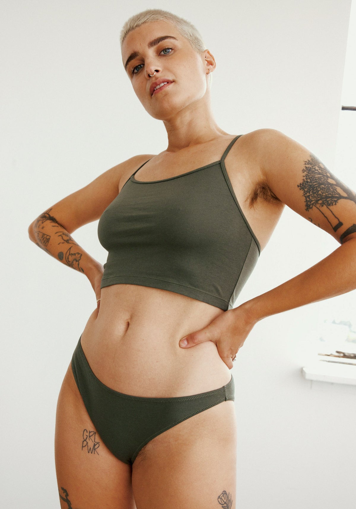 model is wearing an M cami - green the cotton crop cami