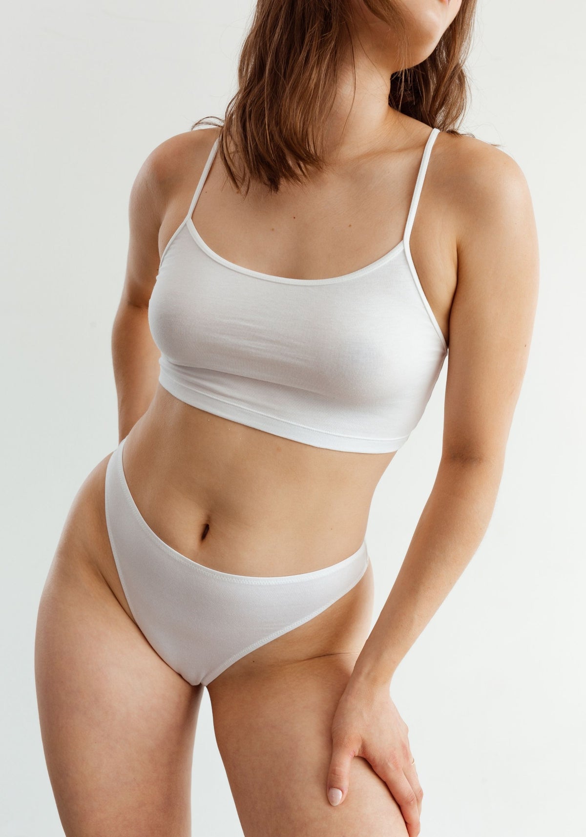 model is wearing an M cami-white the cotton crop cami