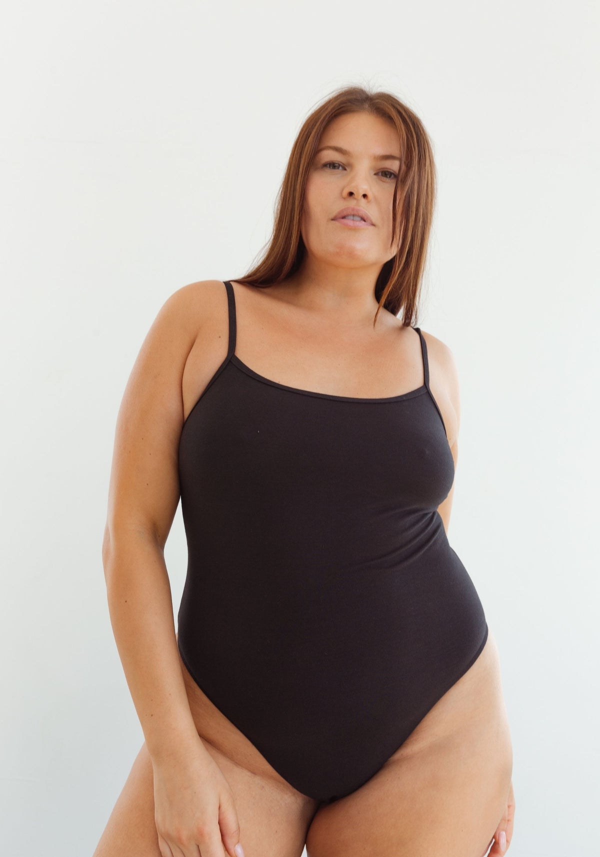 model is wearing an L bodysuit -black the cotton bodysuit
