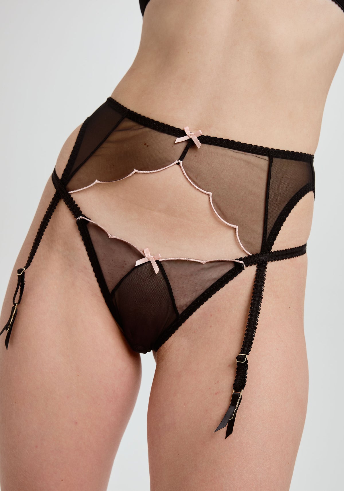 model is wearing an S/M garter belt - black lulu garter belt