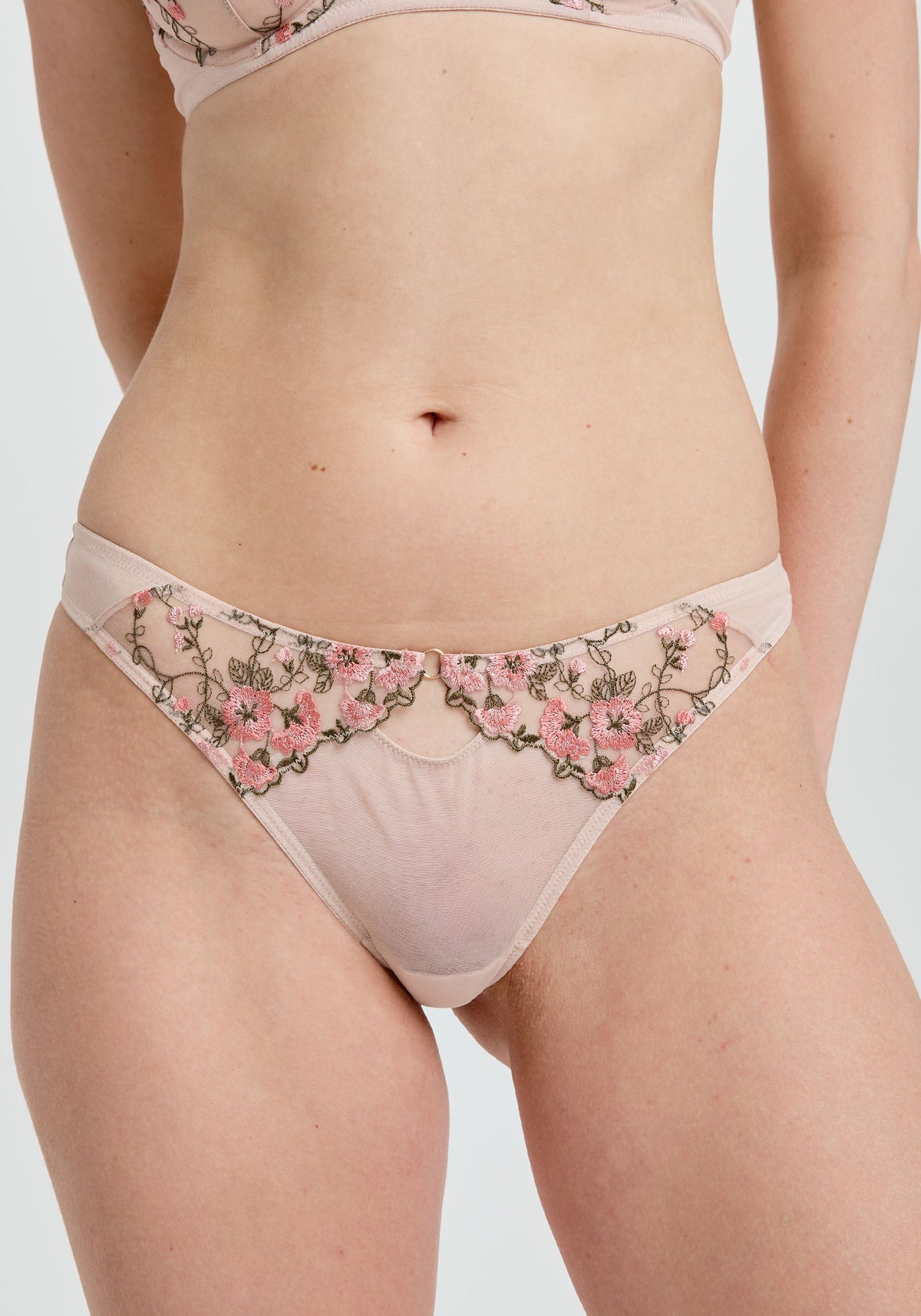 model is wearing an S panty - multi camellia thong