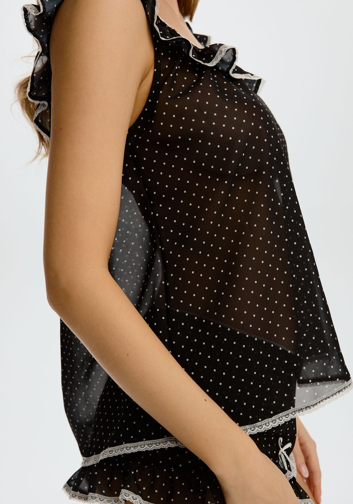 model is wearing an S babydoll - black,multi delphine babydoll