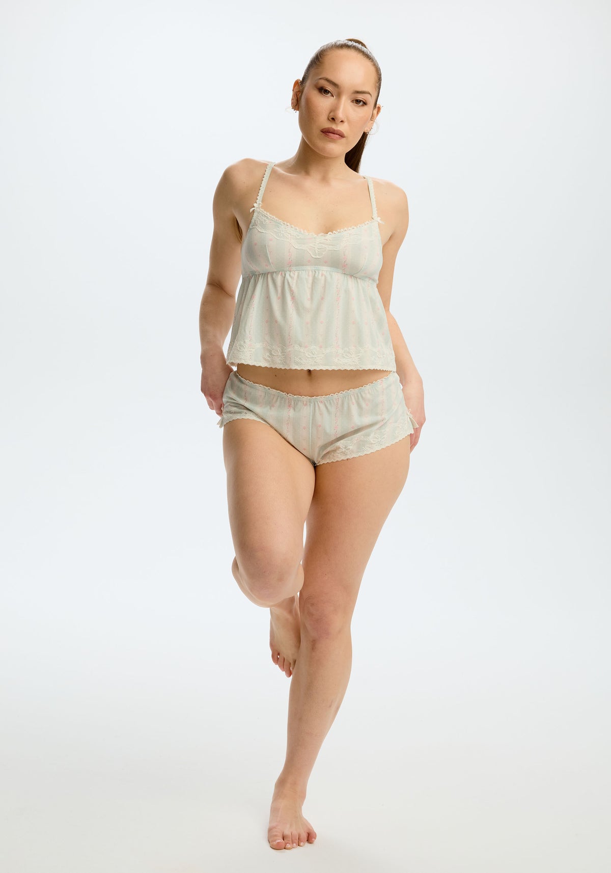 model is wearing an M panty - multi althea tap short