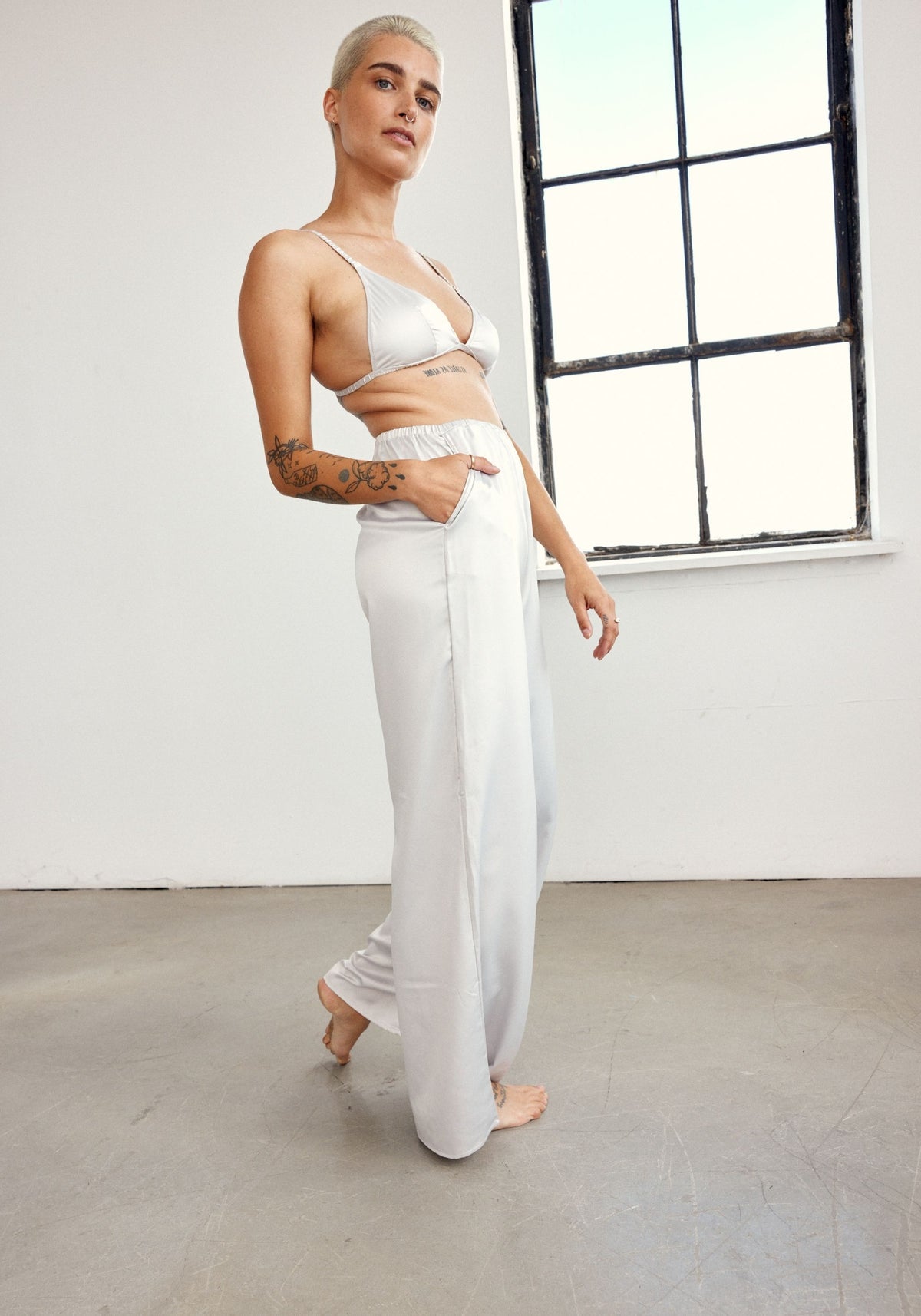 model is wearing an S pant - grey after hours satin pant