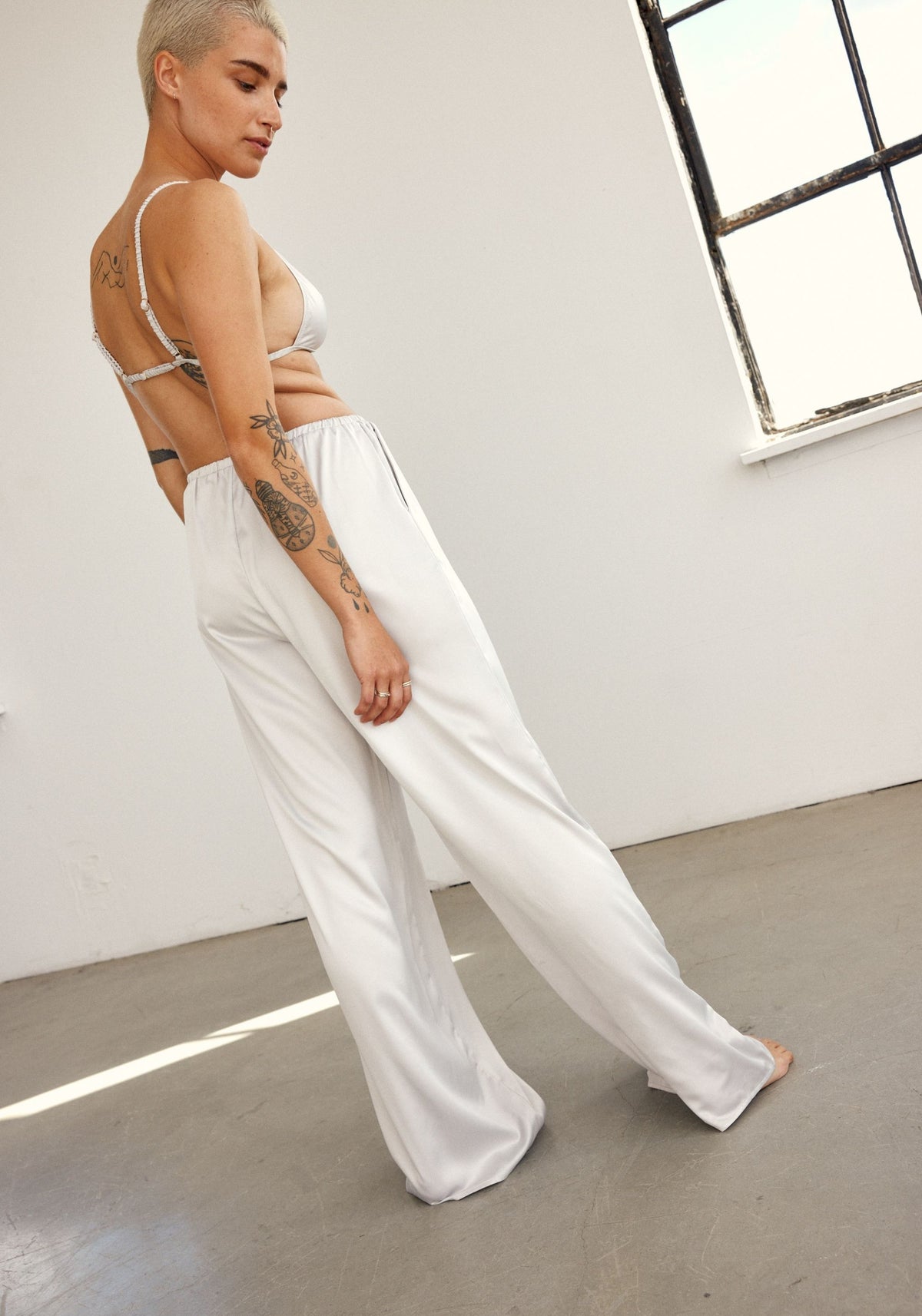 model is wearing an S pant - grey after hours satin pant