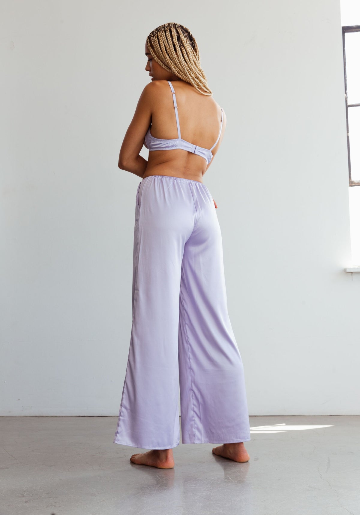 model is wearing an M pant-purple after hours satin pant