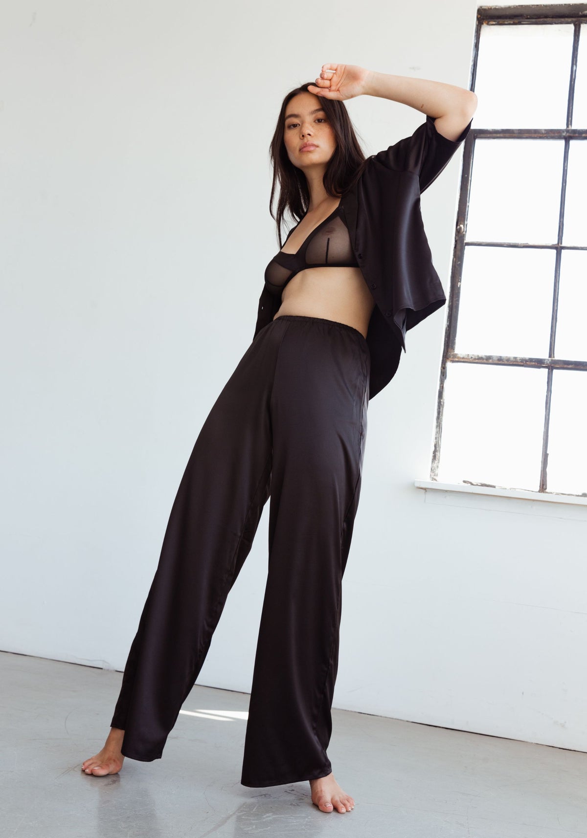 model is wearing an S pant-black after hours satin pant