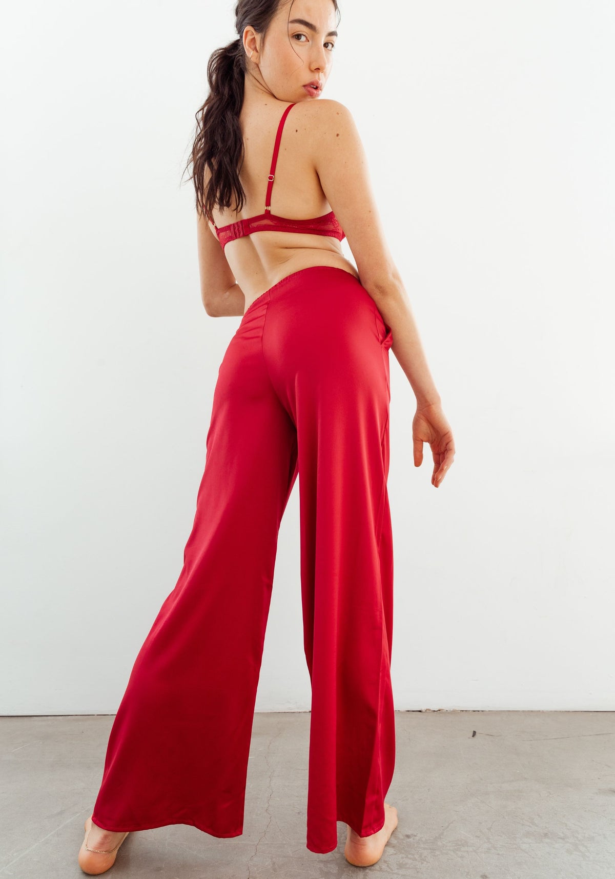 model is wearing an S pant-red after hours satin pant