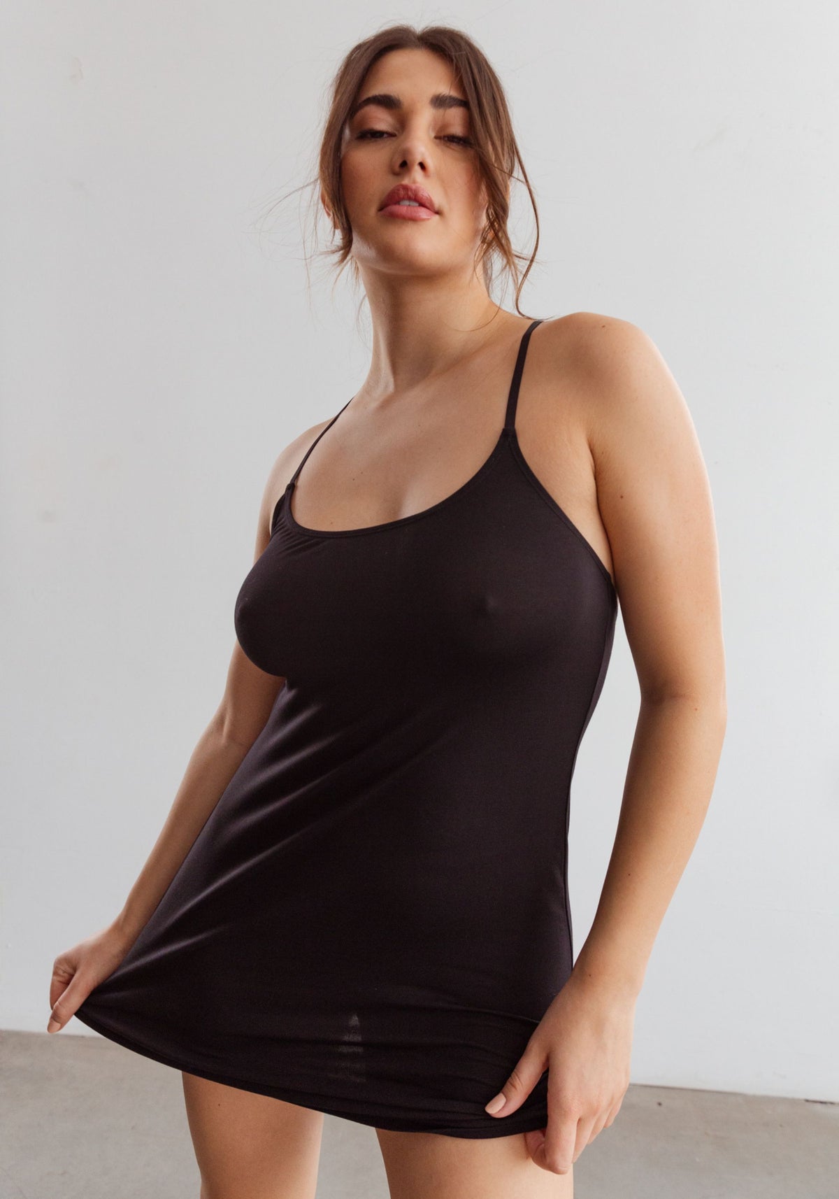 model is wearing an M slip-black unplug modal slip dress