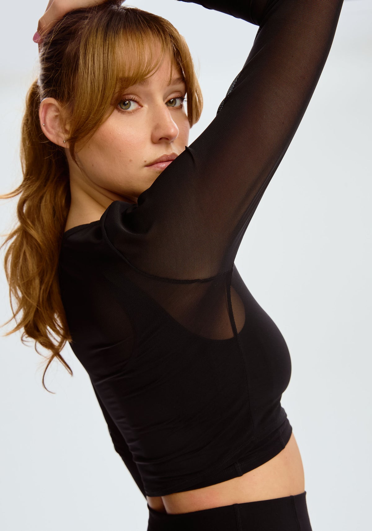 model is wearing an S top-black pulse long sleeve crop top