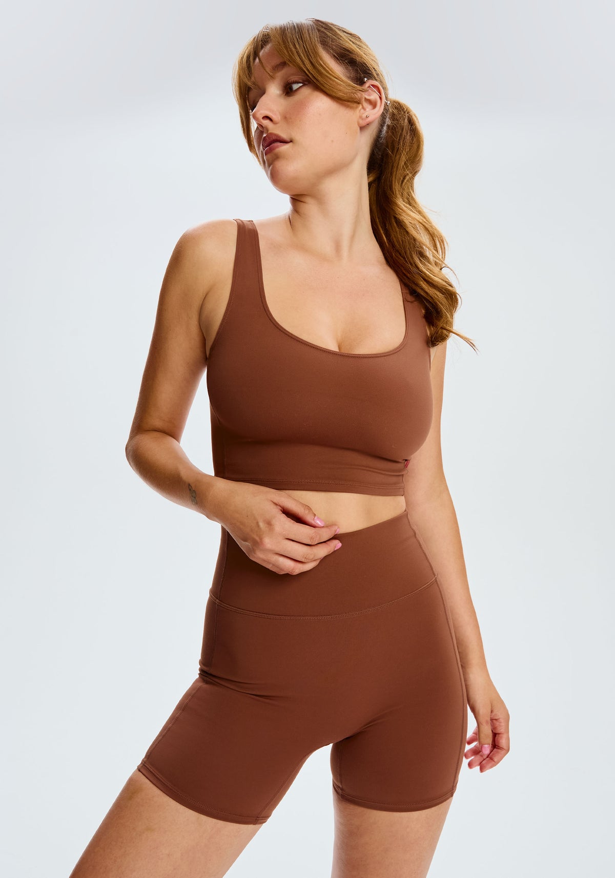 model is wearing an S short-brown core short