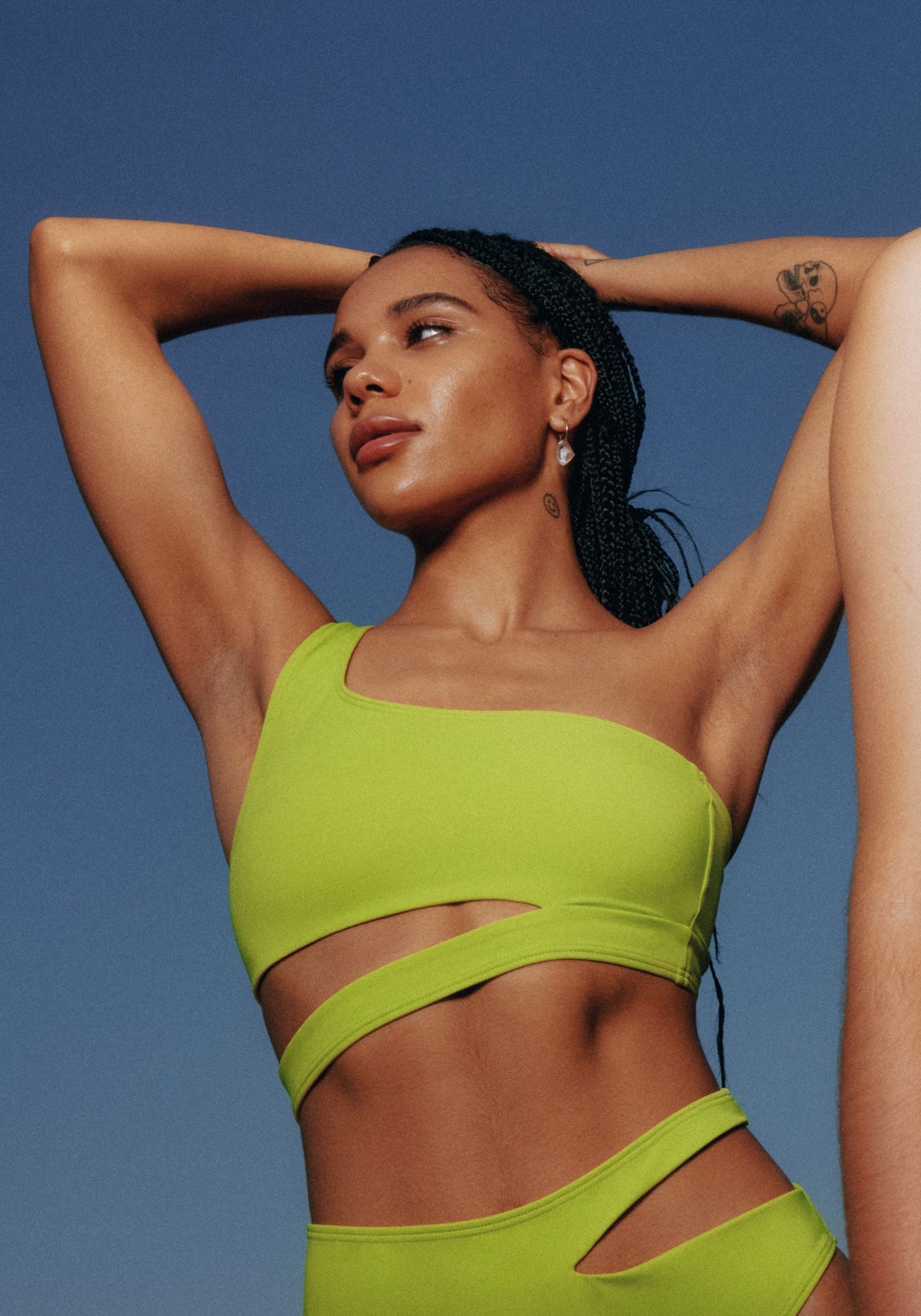 model is wearing an S bikini top-green jade asymmetric bikini top