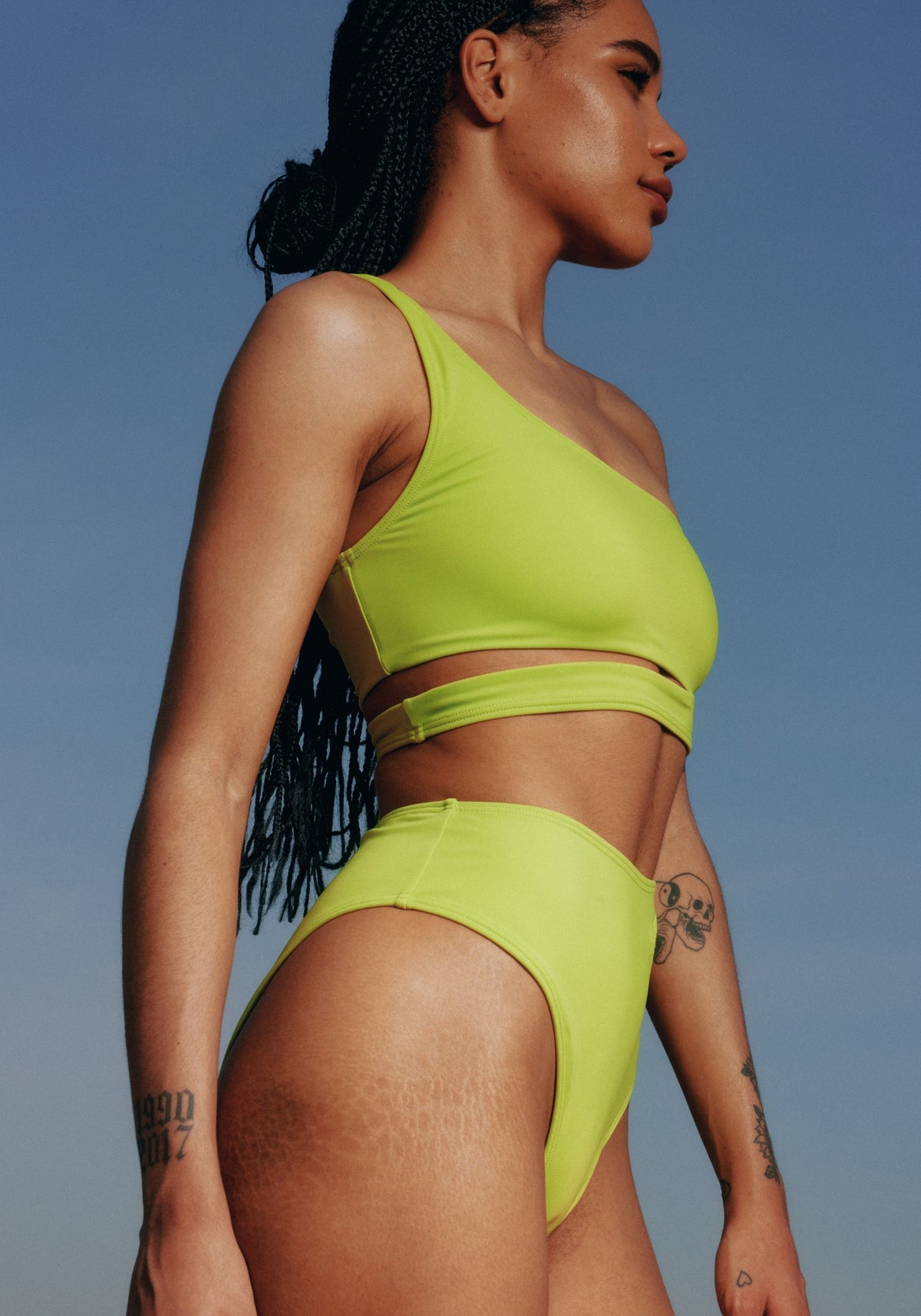 model is wearing an S bikini top-green jade asymmetric bikini top