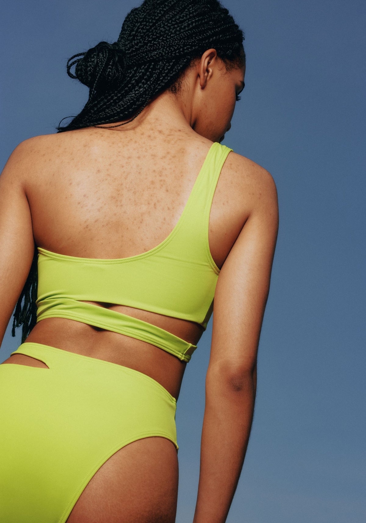 model is wearing an S bikini top-green jade asymmetric bikini top