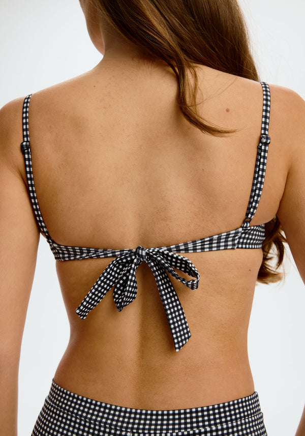 model is wearing an S bikini top - black,multi aura push-up bikini top