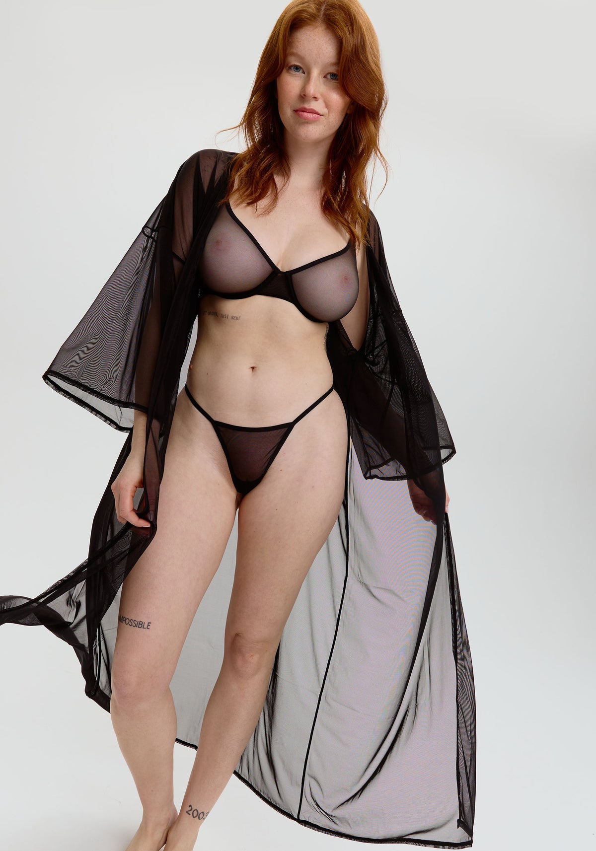 model is wearking a size 1 kimono-black gaia kimono